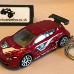 RENAULT MEGANE TROPHY KEYRING / KEYCHAIN 1/56 SCALE METALLIC RED NO 3