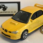 SUBARU IMPREZA KEYRING / KEYCHAIN 1/56 SCALE YELLOW