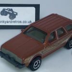 AMC EAGLE 1980 KEYRING 1/56 SCALE COPPER & WOODGRAIN