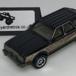 AMC EAGLE 1980 KEYRING 1/56 SCALE BLACK & WOODGRAIN