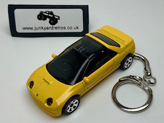 MAZDA AUTOZAM AZ-1 1992 KEYRING / KEYCHAIN 1/56 SCALE YELLOW