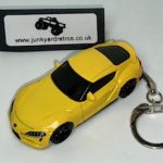 TOYOTA SUPRA GR 2023 KEYRING / KEYCHAIN 1/56 SCALE YELLOW