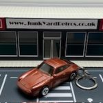 PORSCHE 911 CARRERA 1996 KEYRING / KEYCHAIN 1/56 SCALE METALLIC BROWN